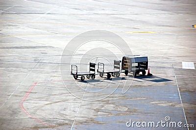 a baggage carrier at an airport figgerits|A baggage carrier at an airport Figgerits [ Answers ].